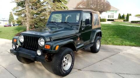 1998 Jeep Wrangler for sale at Heartbeat Used Cars & Trucks in Harrison Township MI