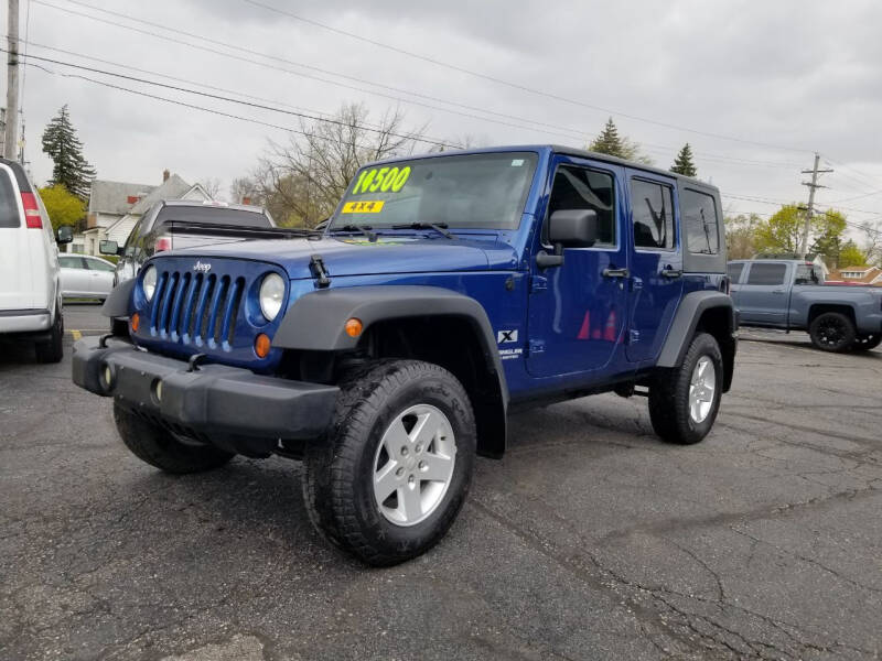 2009 Jeep Wrangler Unlimited for sale at DALE'S AUTO INC in Mount Clemens MI