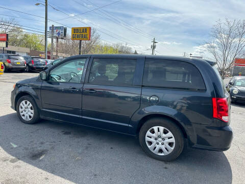 2014 Dodge Grand Caravan for sale at Diana Rico LLC in Dalton GA