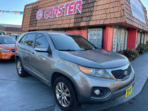 2011 Kia Sorento for sale at CARSTER in Huntington Beach CA