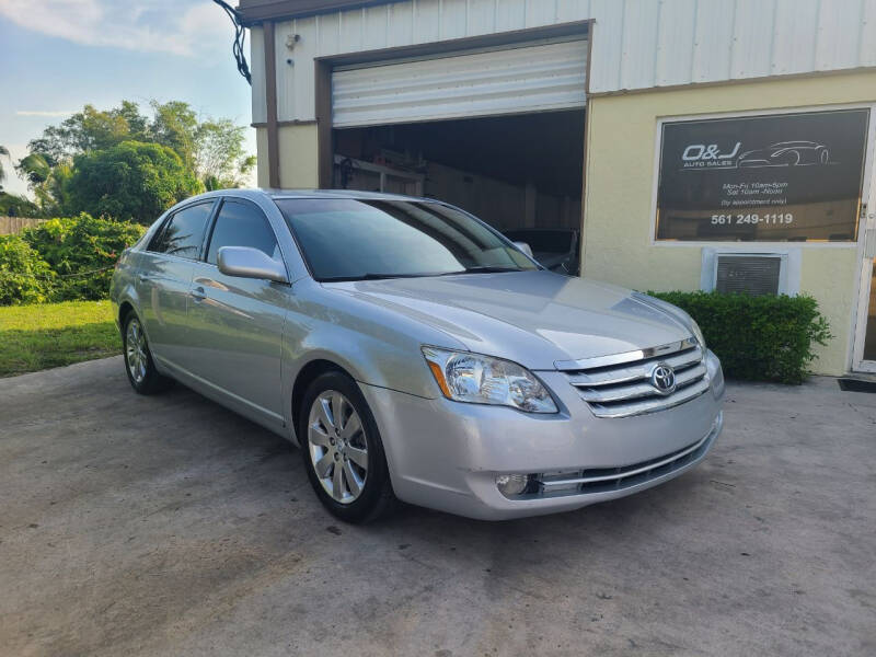 2005 Toyota Avalon for sale at O & J Auto Sales in Royal Palm Beach FL