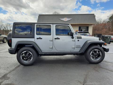 2014 Jeep Wrangler Unlimited for sale at G AND J MOTORS in Elkin NC