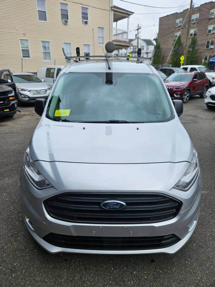 2019 Ford Transit Connect for sale at RENOS AUTO SALES LLC in Waterbury, CT