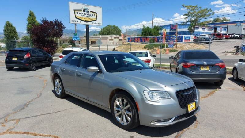 2015 Chrysler 300 for sale at CarSmart Auto Group in Murray UT