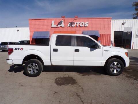 2014 Ford F-150 for sale at L A AUTOS in Omaha NE