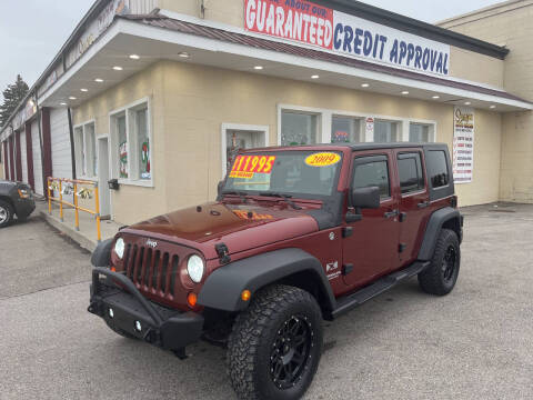 2009 Jeep Wrangler Unlimited for sale at Suarez Auto Sales in Port Huron MI