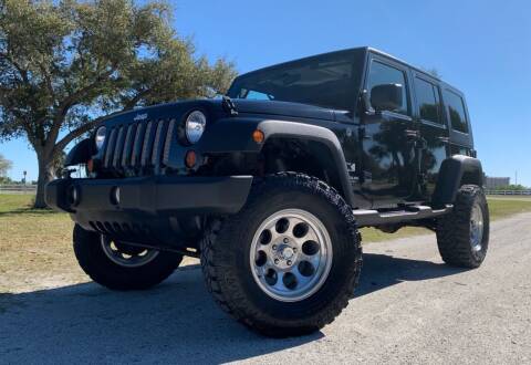 2008 Jeep Wrangler Unlimited for sale at PennSpeed in New Smyrna Beach FL