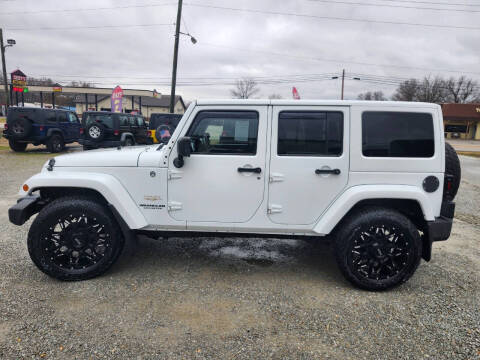 2014 Jeep Wrangler Unlimited for sale at KNOBEL AUTO SALES, LLC in Corning AR