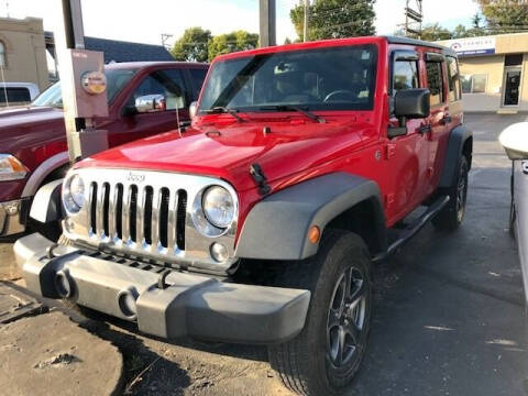 2015 Jeep Wrangler Unlimited for sale at RT Auto Center in Quincy IL