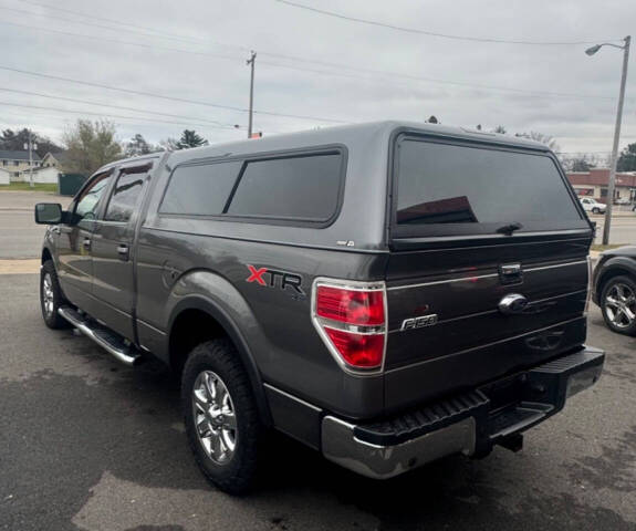 2014 Ford F-150 for sale at SIGNATURE AUTOS LLC in Weston, WI