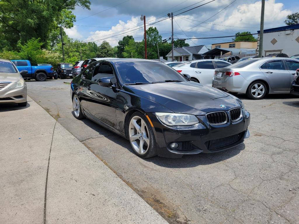 2011 BMW 3 Series for sale at DAGO'S AUTO SALES LLC in Dalton, GA