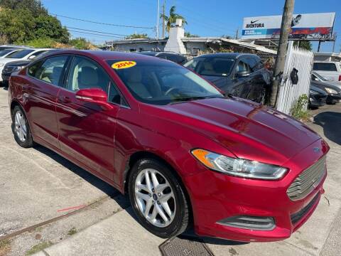 2014 Ford Fusion for sale at Plus Auto Sales in West Park FL