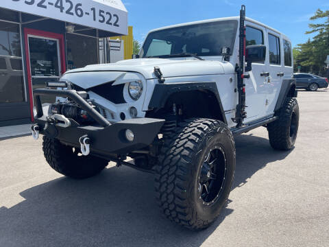 2015 Jeep Wrangler Unlimited for sale at Mainstreet Motor Company in Hopkins MN