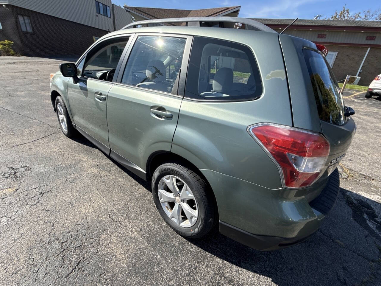 2015 Subaru Forester for sale at Rochester Imports LLC in Webster, NY