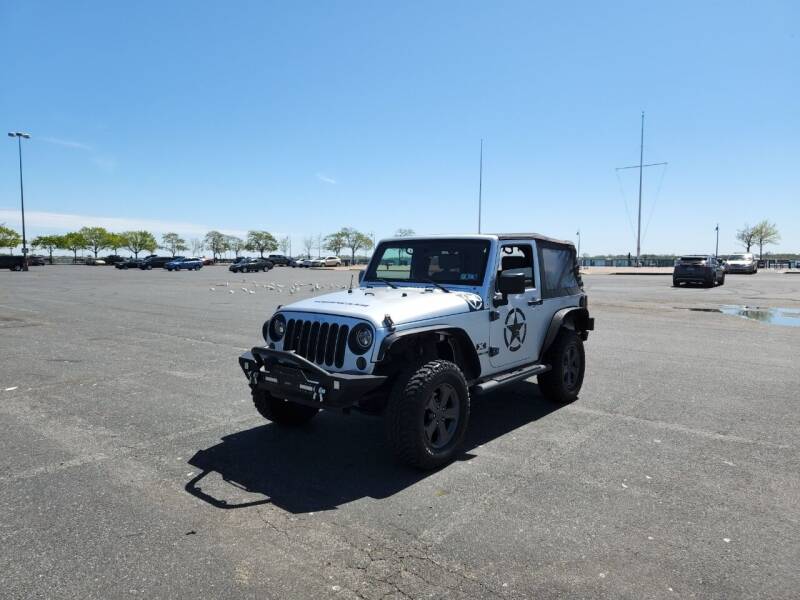 2009 Jeep Wrangler for sale at BH Auto Group in Brooklyn NY