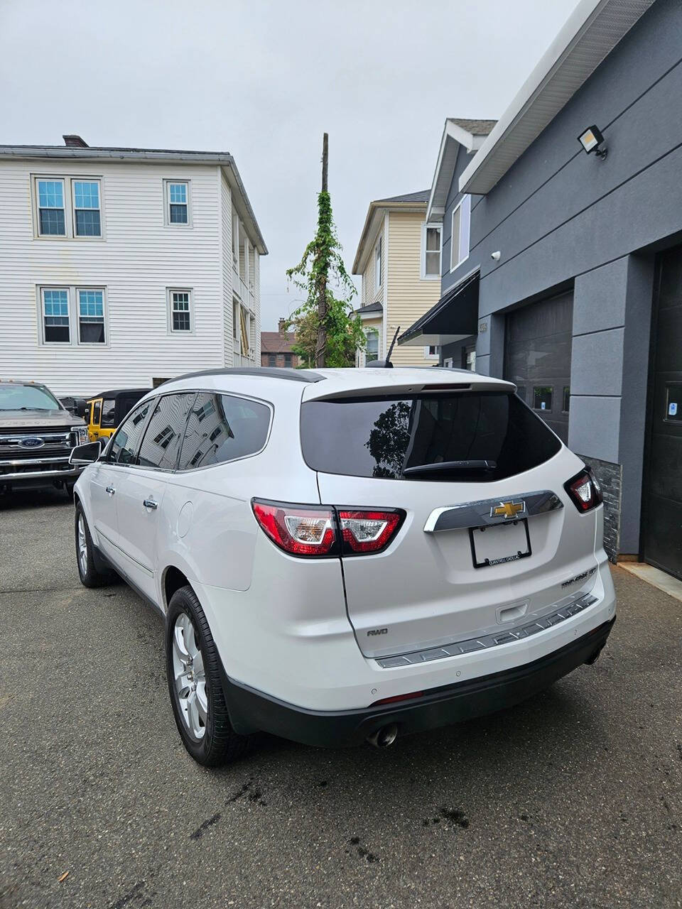 2016 Chevrolet Traverse for sale at RENOS AUTO SALES LLC in Waterbury, CT