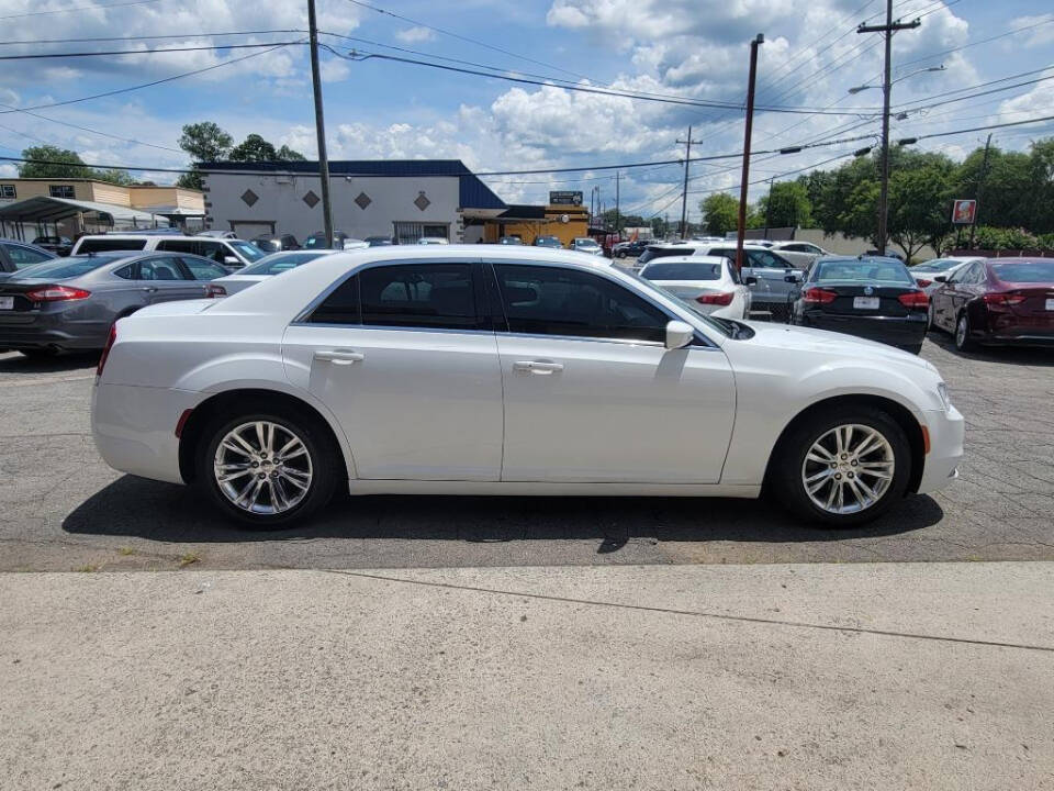 2018 Chrysler 300 for sale at DAGO'S AUTO SALES LLC in Dalton, GA