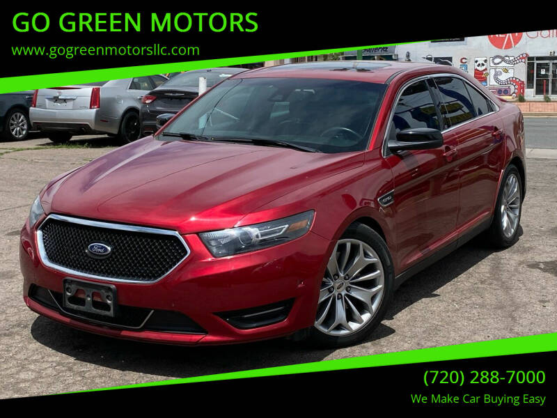 2014 Ford Taurus for sale at GO GREEN MOTORS in Lakewood CO