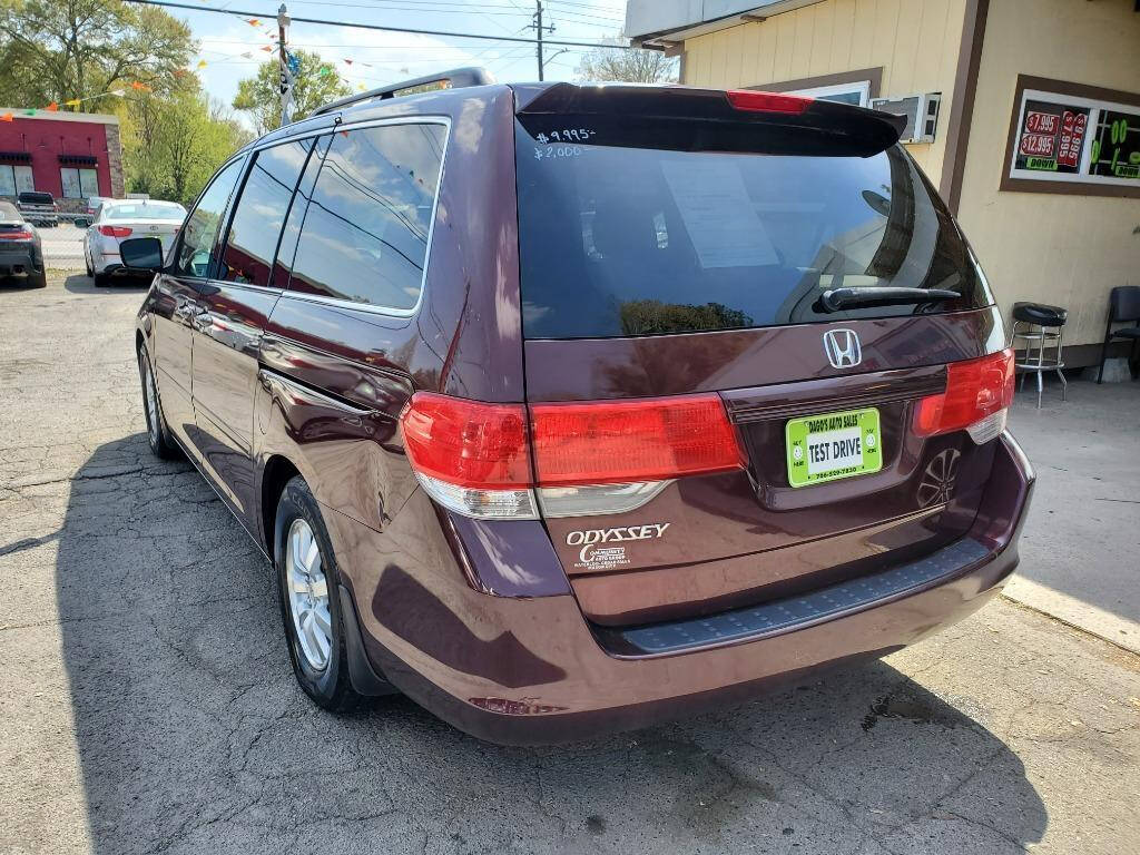 2010 Honda Odyssey for sale at DAGO'S AUTO SALES LLC in Dalton, GA