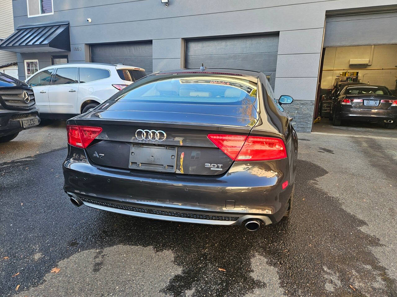 2014 Audi A7 for sale at RENOS AUTO SALES LLC in Waterbury, CT