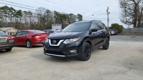 2018 Nissan Rogue for sale at DADA AUTO INC in Monroe NC