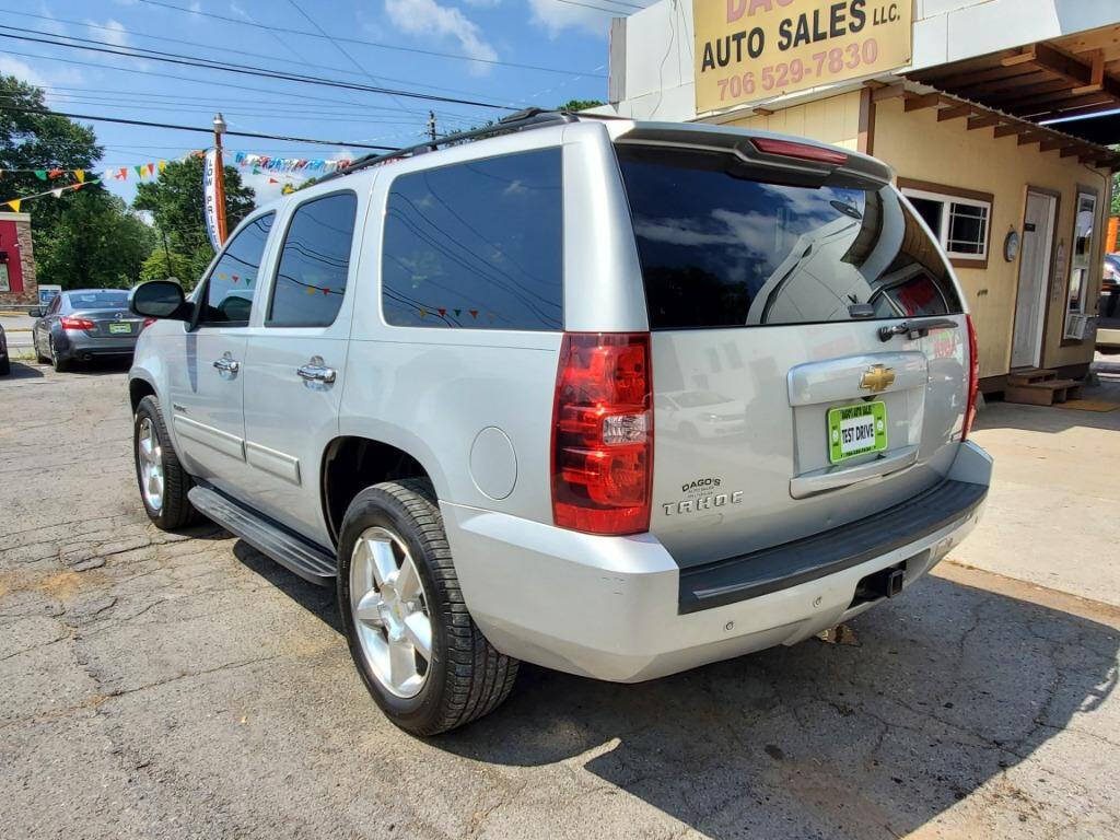 2011 Chevrolet Tahoe for sale at DAGO'S AUTO SALES LLC in Dalton, GA