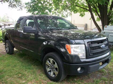 2014 Ford F-150 for sale at THOM'S MOTORS in Houston TX