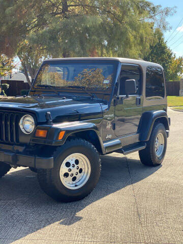 1999 Jeep Wrangler for sale at Andover Auto Group, LLC. in Argyle TX