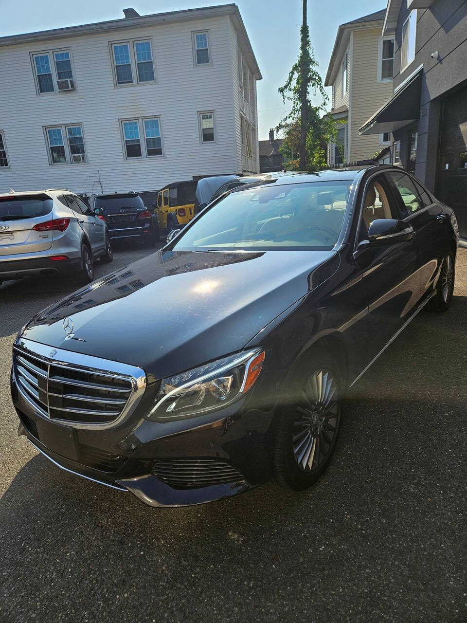 2015 Mercedes-Benz C-Class for sale at RENOS AUTO SALES LLC in Waterbury, CT