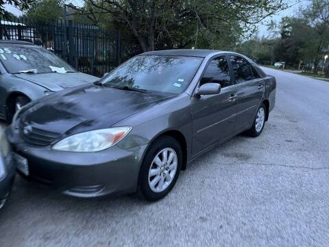 2002 Toyota Camry for sale at SCOTT HARRISON MOTOR CO in Houston TX