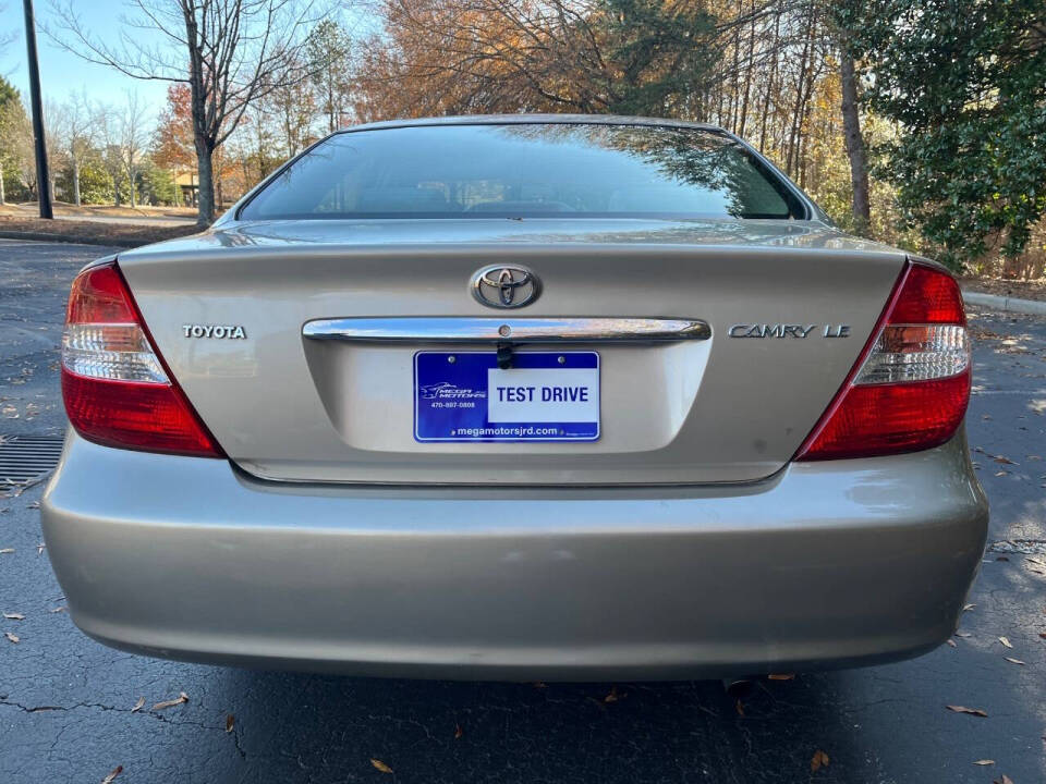 2002 Toyota Camry for sale at Megamotors JRD in Alpharetta, GA