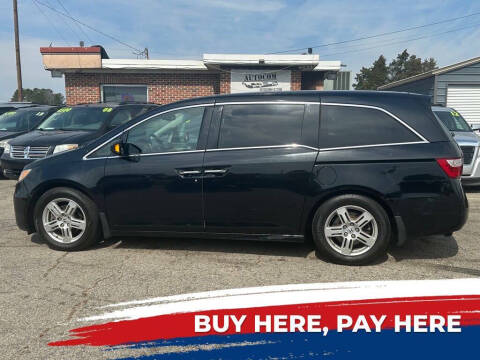 2012 Honda Odyssey for sale at Autocom, LLC in Clayton NC