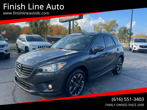 2016 Mazda CX-5 for sale at Finish Line Auto in Comstock Park MI