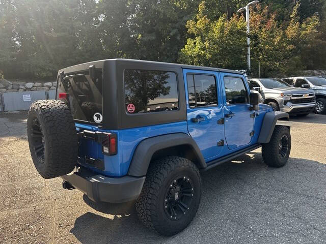 2016 Jeep Wrangler Unlimited for sale at Bowman Auto Center in Clarkston, MI