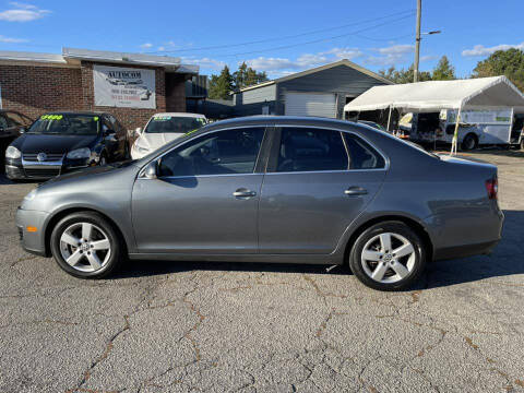 2009 Volkswagen Jetta for sale at Autocom, LLC in Clayton NC