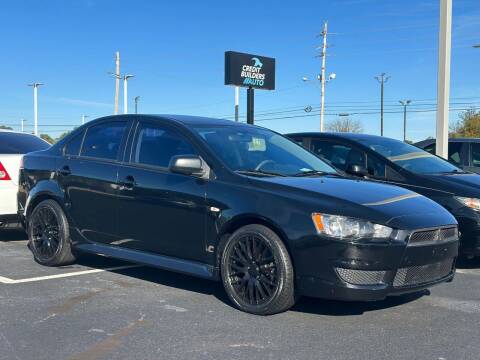 2014 Mitsubishi Lancer for sale at Credit Builders Auto in Texarkana TX