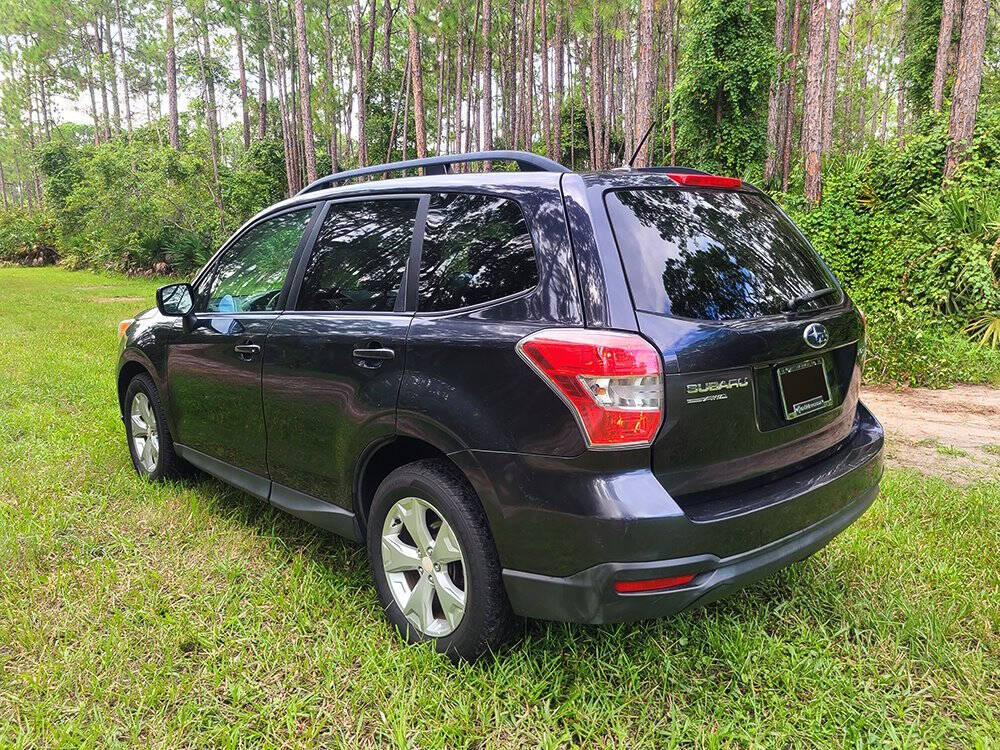 2014 Subaru Forester for sale at Flagler Auto Center in Bunnell, FL