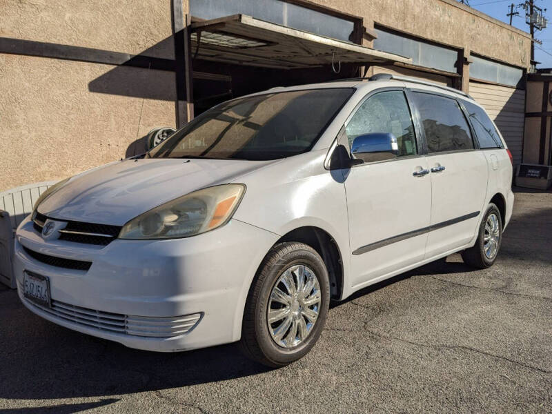 2004 Toyota Sienna for sale at Vehicle Center in Rosemead CA