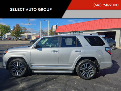 2014 Toyota 4Runner for sale at Select Auto Group in Wyoming MI