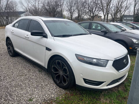 2013 Ford Taurus for sale at HEDGES USED CARS in Carleton MI