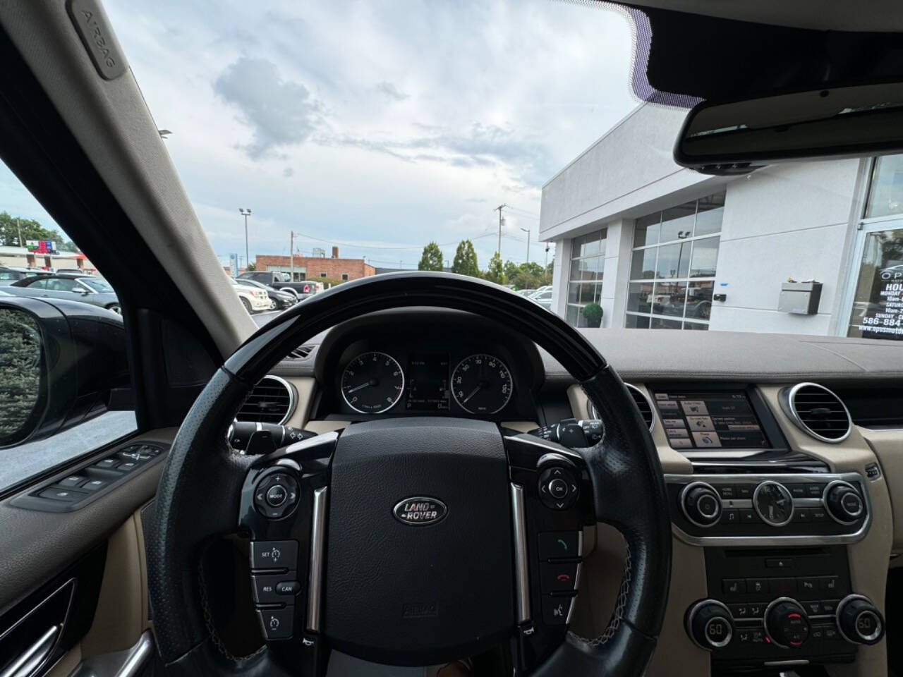 2015 Land Rover LR4 for sale at Opus Motorcars in Utica, MI