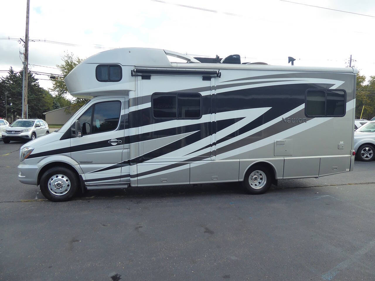 2015 Winnebago Navion for sale at Lakeshore Autos in Holland, MI