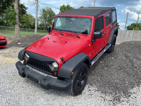 2011 Jeep Wrangler Unlimited for sale at Alpha Automotive in Odenville AL