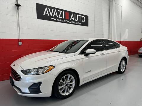 2019 Ford Fusion Hybrid for sale at AVAZI AUTO GROUP LLC in Gaithersburg MD