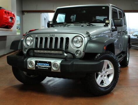 2014 Jeep Wrangler Unlimited for sale at Motion Auto Sport in North Canton OH