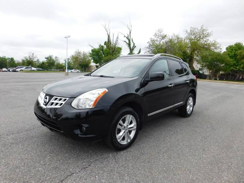 2013 Nissan Rogue for sale at AMERICAR INC in Laurel MD