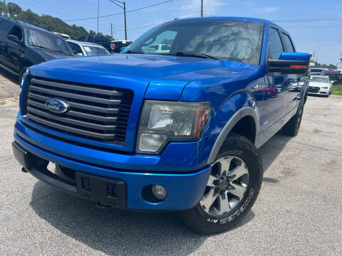 2012 Ford F-150 for sale at Philip Motors Inc in Snellville GA