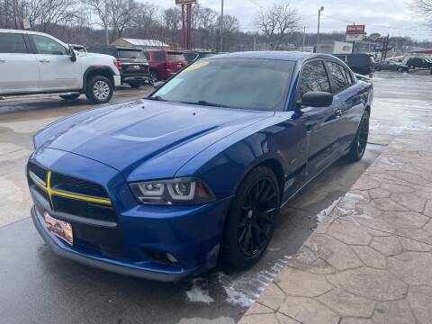 2012 Dodge Charger for sale at Azteca Auto Sales LLC in Des Moines IA