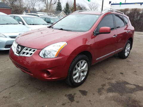 2011 Nissan Rogue for sale at Queen Auto Sales in Denver CO