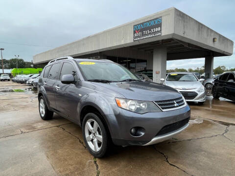 2007 Mitsubishi Outlander for sale at ZORA MOTORS in Rosenberg TX